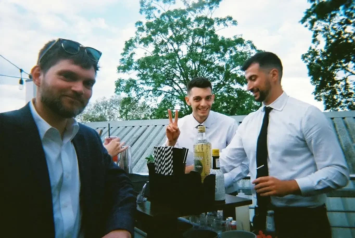 Live cocktail making performance at wedding with professional mobile bar hire service in London