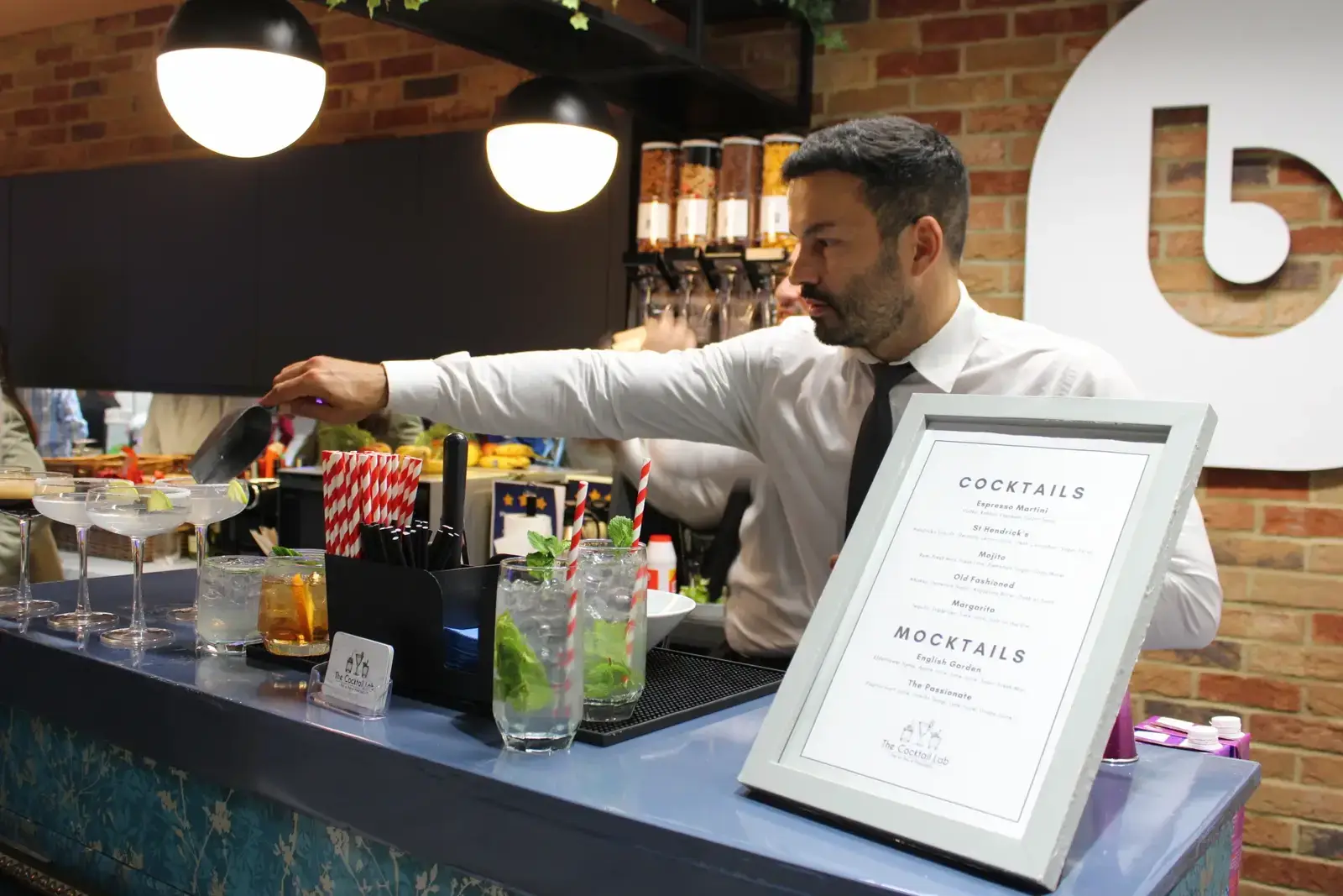 Elegant boutique bar serving mocktails at London baby shower celebration