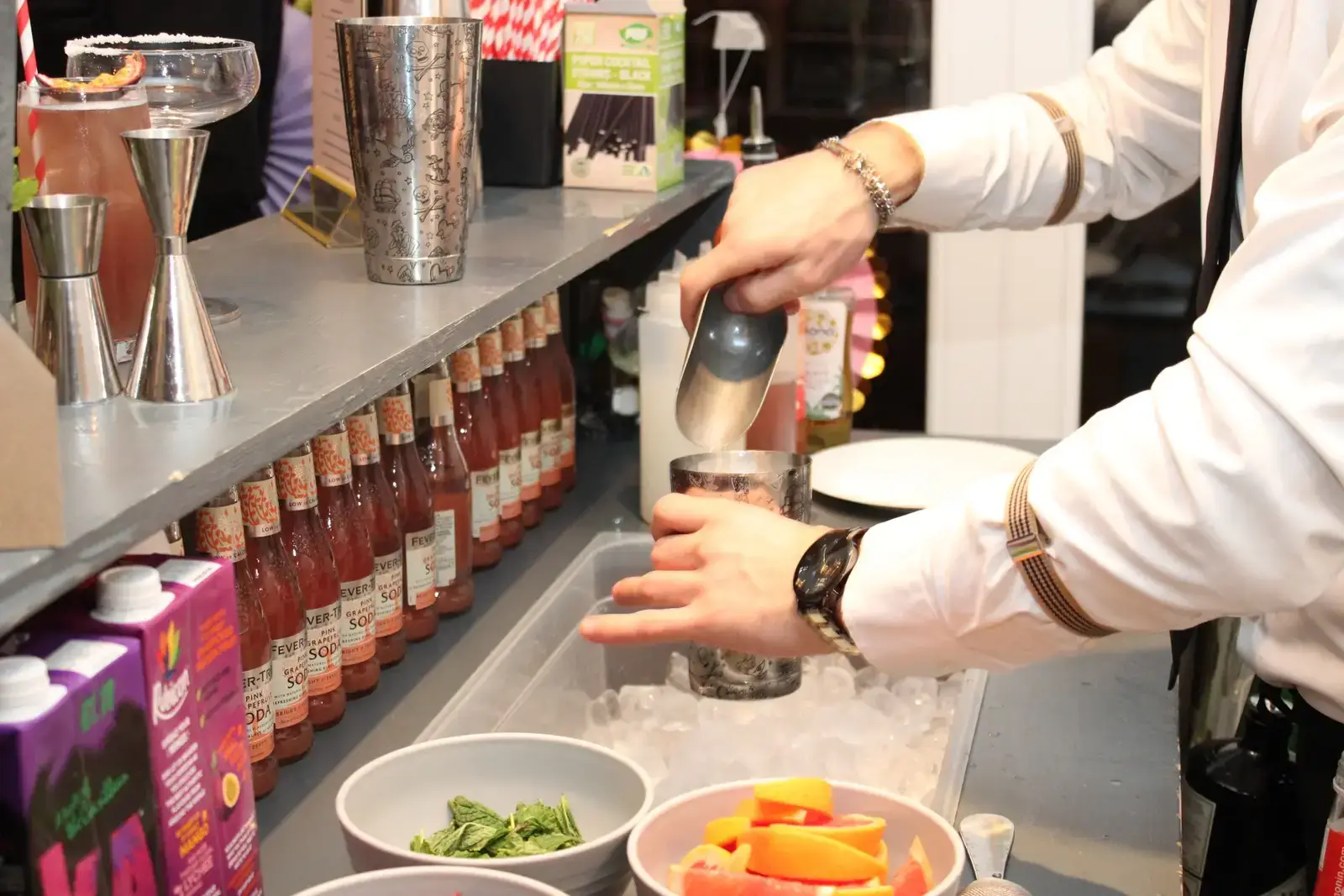 Fun cocktail making class at pastel bar in beautiful London garden setting