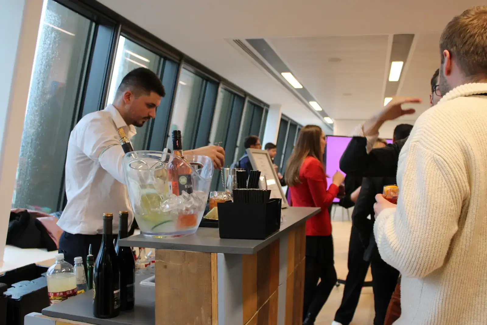 Elegant pastel bar serving refreshing cocktails at Wimbledon party in London