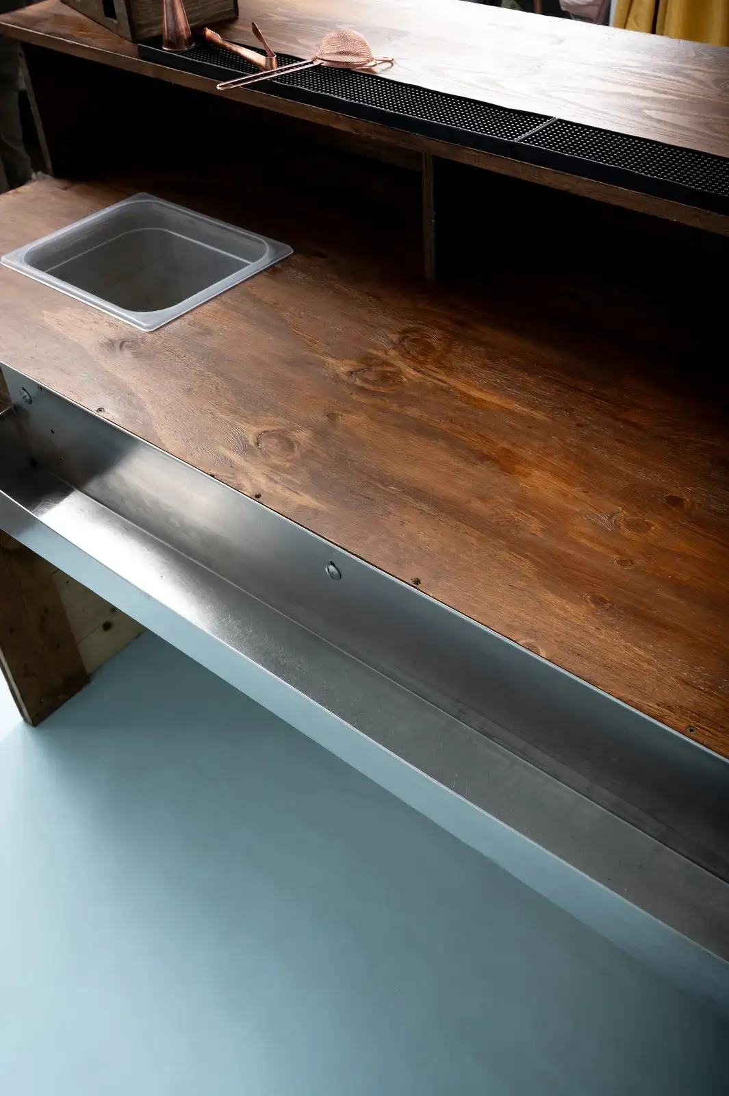 Custom 2m rustic bar providing ample space for large London gatherings