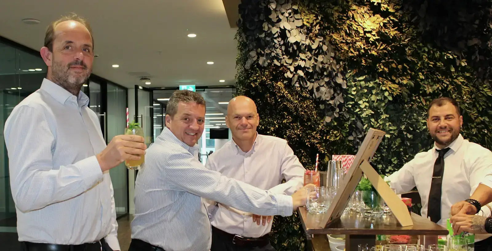 A branded corporate cocktail bar served by mixologists at a London company event
